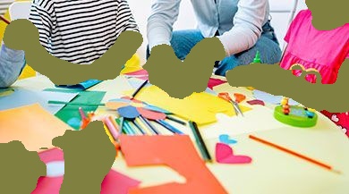 Children and teacher at a table doing crafts. Colorful paper, scissors, pencils, and glue are visible.